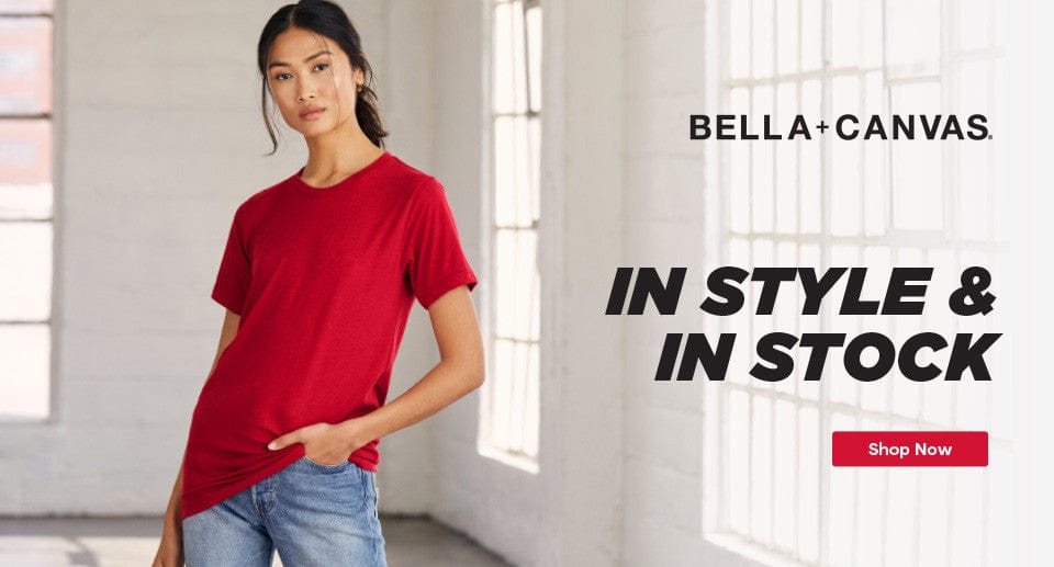 Woman wearing a red t-shirt with 'Bella+Canvas' branding and promotional text.