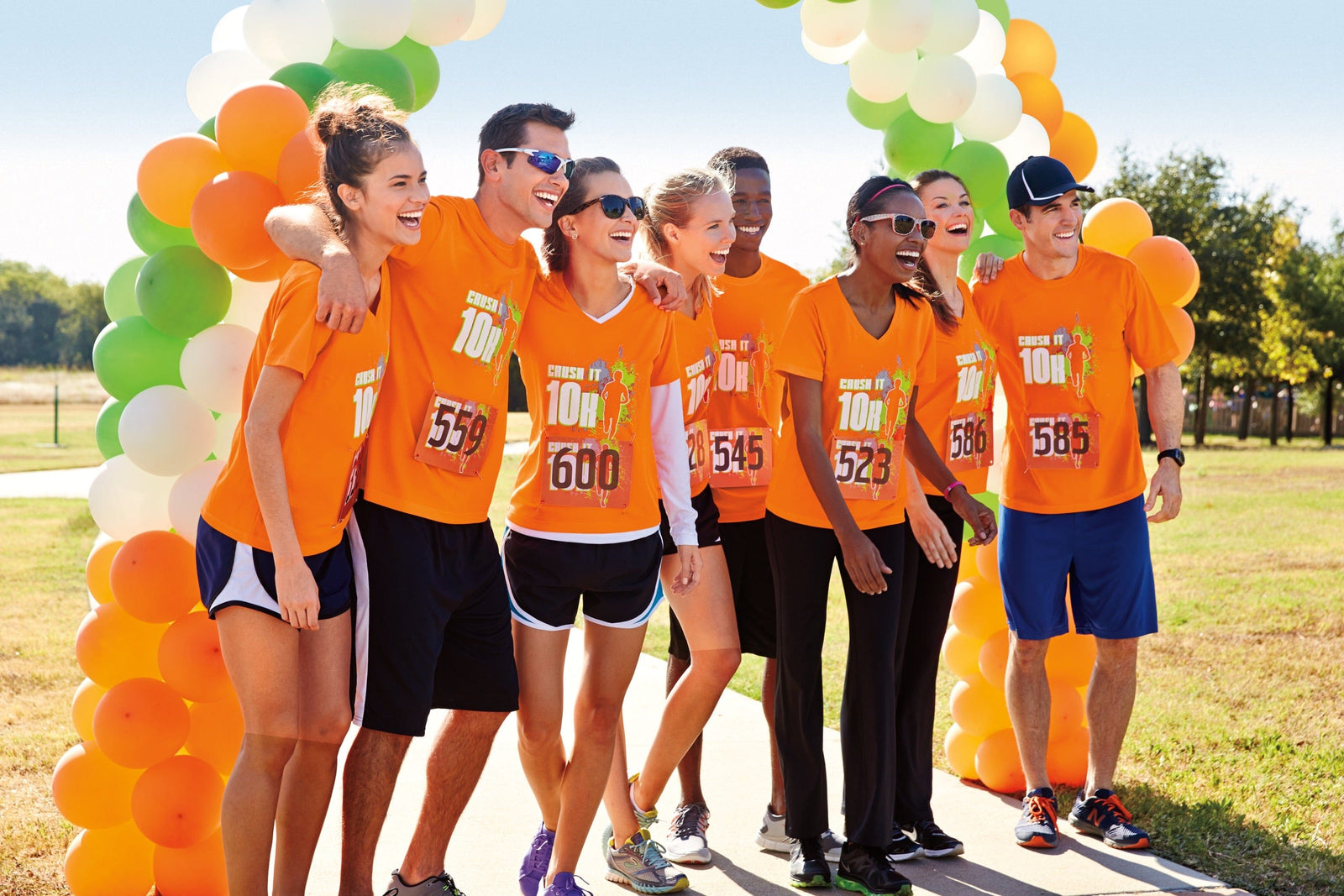 People laughing before a 10k race